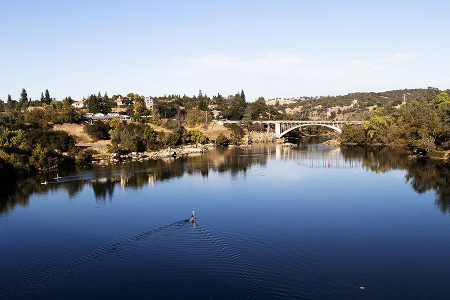Roseville, CA Insurance - Folsom Lake in California, a Boat Crossing By