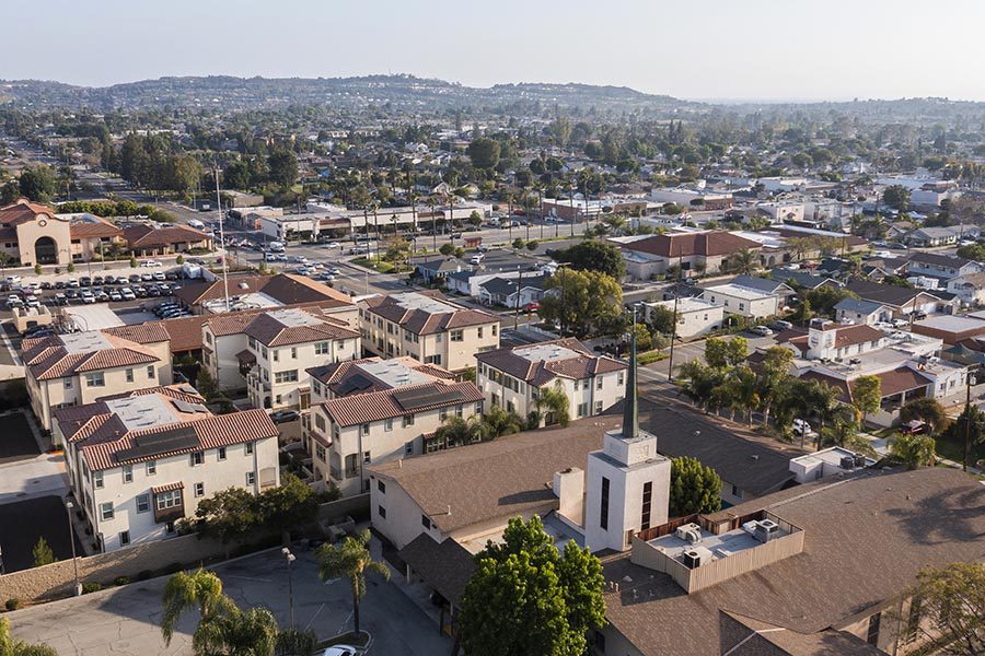 Whittier, CA Insurance - Sprawling Residential Area, Homes With Terra Cotta Roofs, Rolling Hills in the Distance